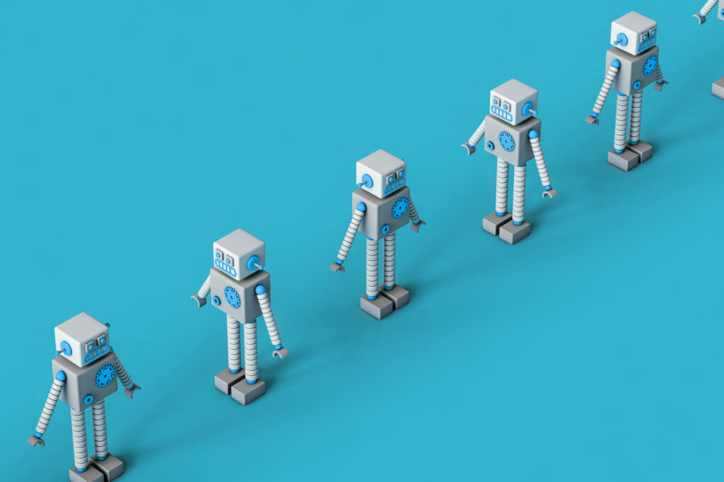 a row of robots on a blue background