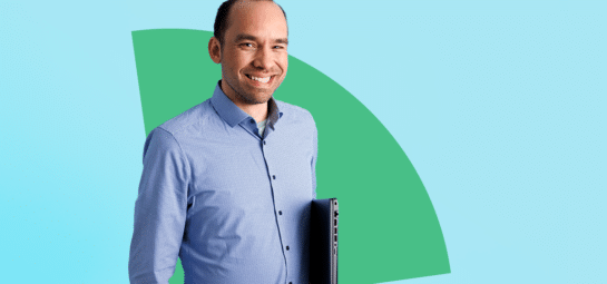 How to build a business case for ITSM - Header image shows an ITSM consultant smiling and holding a laptop.