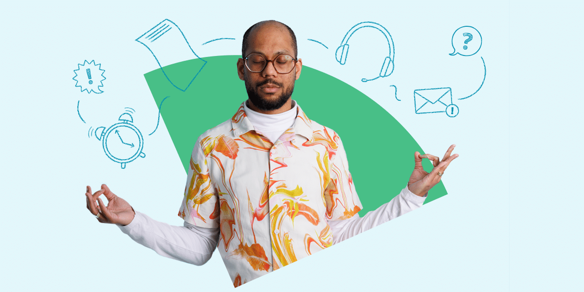 A man with a shaved head and beard, wearing glasses and a colorful, patterned shirt over a white turtleneck, is depicted against a light blue background with a green abstract shape. He is in a meditative pose with his eyes closed, arms relaxed at his sides, and hands forming the 'okay' gesture. Surrounding him are sketched icons representing a clock, an exclamation mark, a document, a headset, an envelope with a notification, and a speech bubble with a question mark. The image conveys a balance between work-related stress and maintaining well-being.