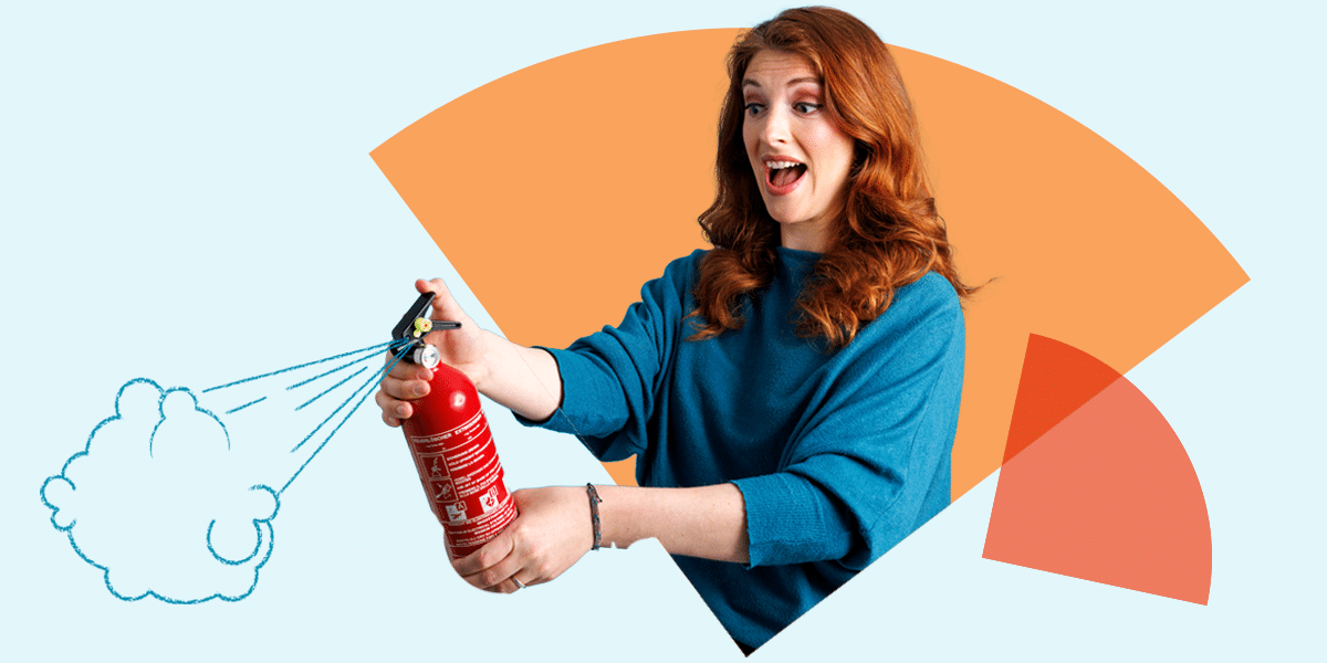 "A woman with long red hair wearing a blue sweater is depicted against a light blue background with orange abstract shapes. She is holding a red fire extinguisher and appears to be spraying it, with a look of excitement or enthusiasm on her face. A sketched cloud of smoke is illustrated coming out from the extinguisher, emphasizing the action of spraying. The image suggests problem management or resolving issues effectively.